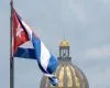 Funcionarios cubanos exponiendo reformas económicas en una conferencia de prensa oficial